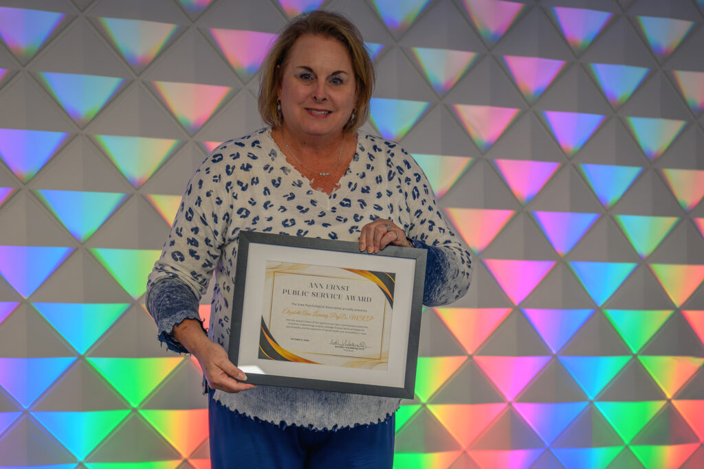 Bethe Lonning being presented with the Ann Ernst Public Service Award